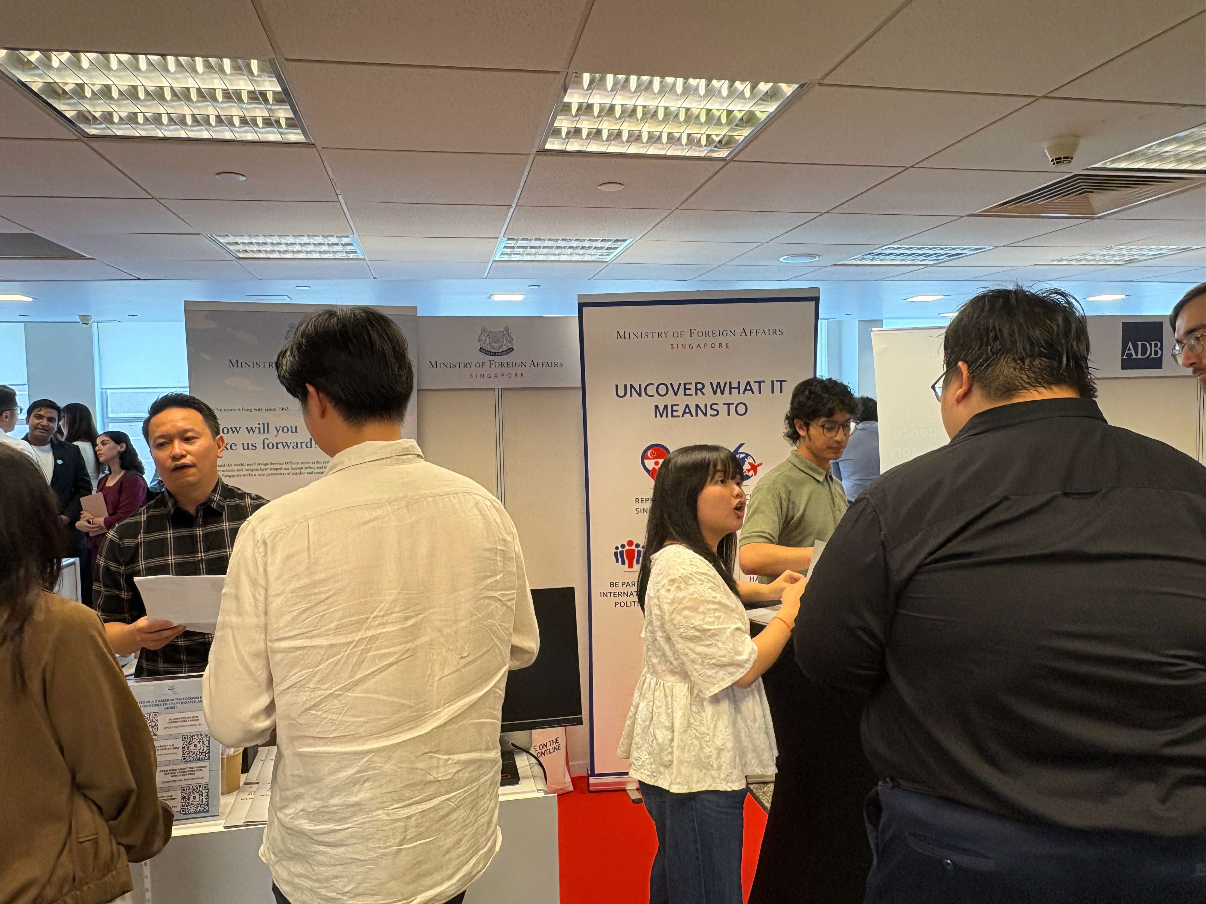 People Interacting at a Career Fair